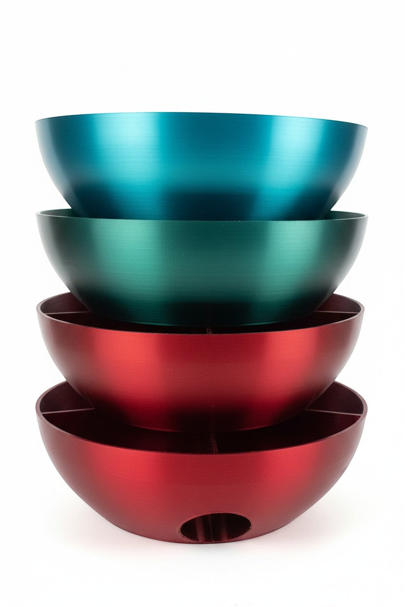 Papa Tee's set of four decorative serving bowls in teal, green, and red with a metallic finish. Plastic construction.
