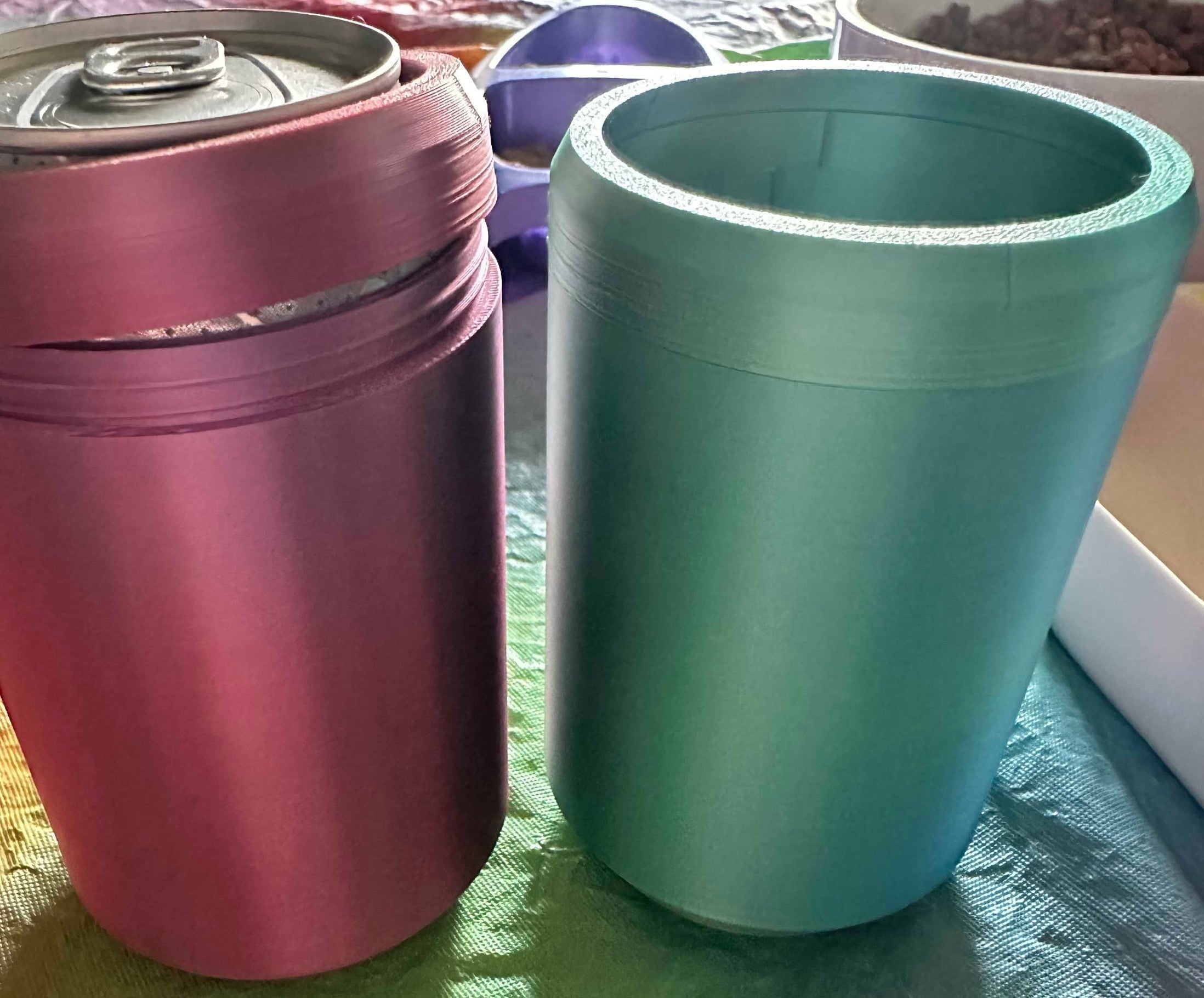 Papa Tee's Insulated Can Cooler Set in teal and magenta, fits 12 oz cans, keeps drinks cold.