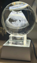 Papa Tee's personalized crystal keepsake with etched ultrasound image, illuminated by LED base.