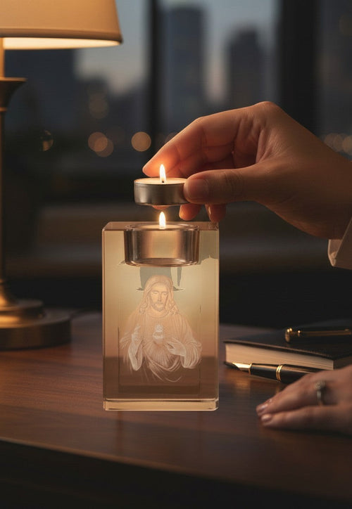 Papa Tee's small crystal keepsake with 2.5D engraving of Jesus, holding a tea light candle.