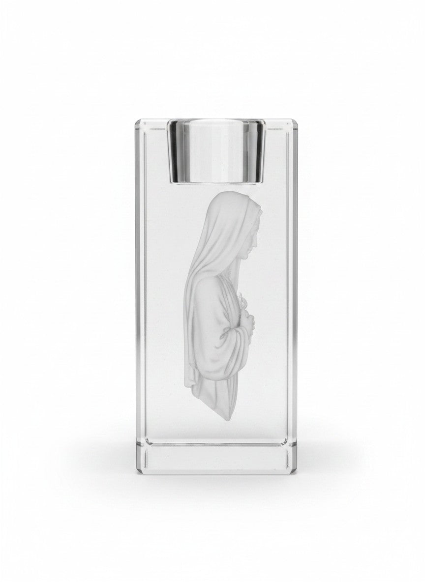 Papa Tee's clear glass votive holder with a frosted relief of the Virgin Mary holding her hands to her chest.