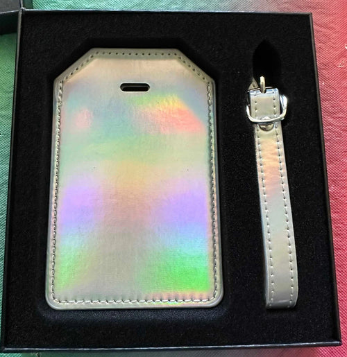 Papa Tee's iridescent holographic luggage tag set with strap, shifts through pastel colors, perfect for travel.