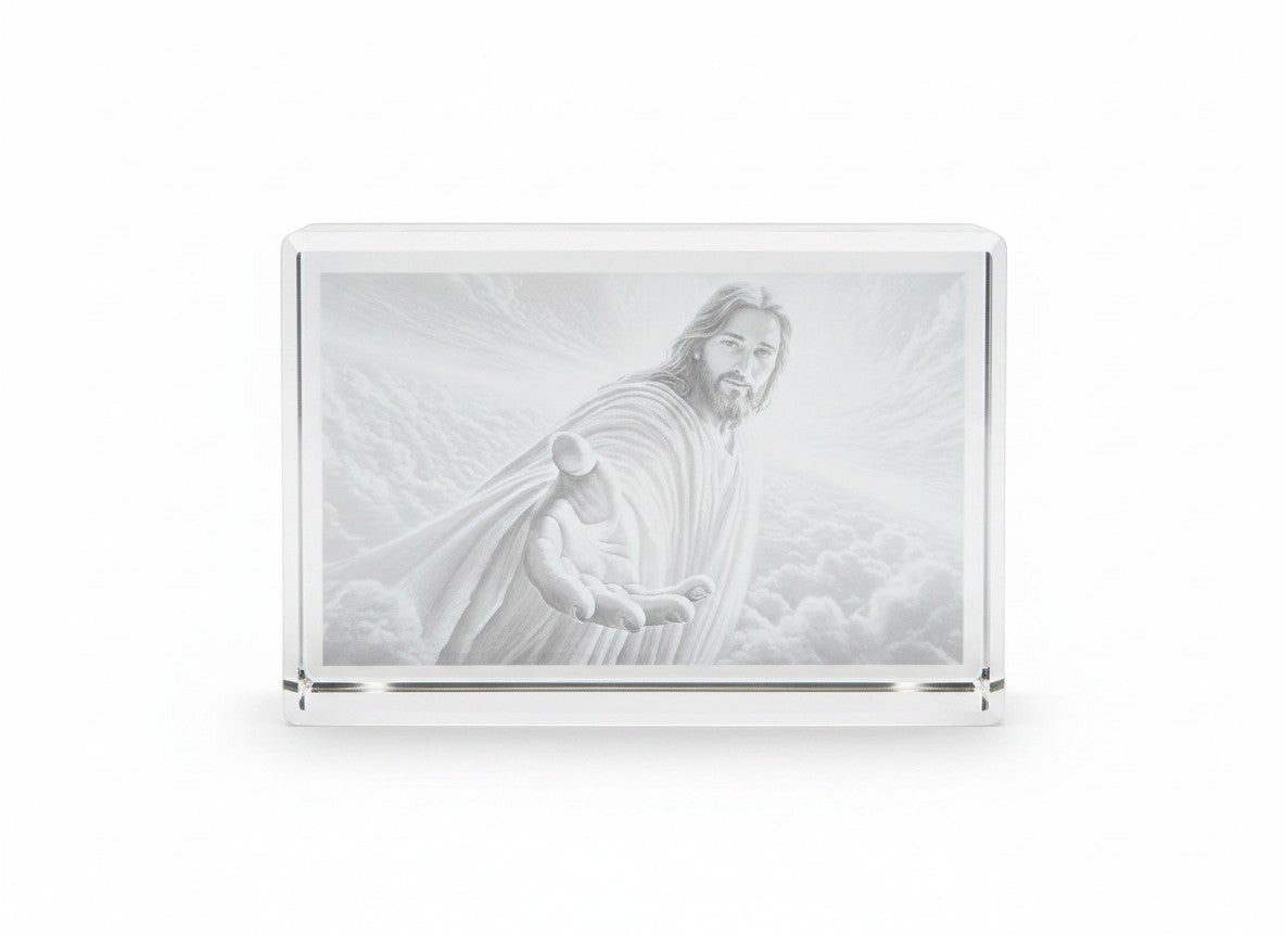 Papa Tee's glass block featuring a pencil drawing of Jesus reaching out his hand, set against a cloudy sky.